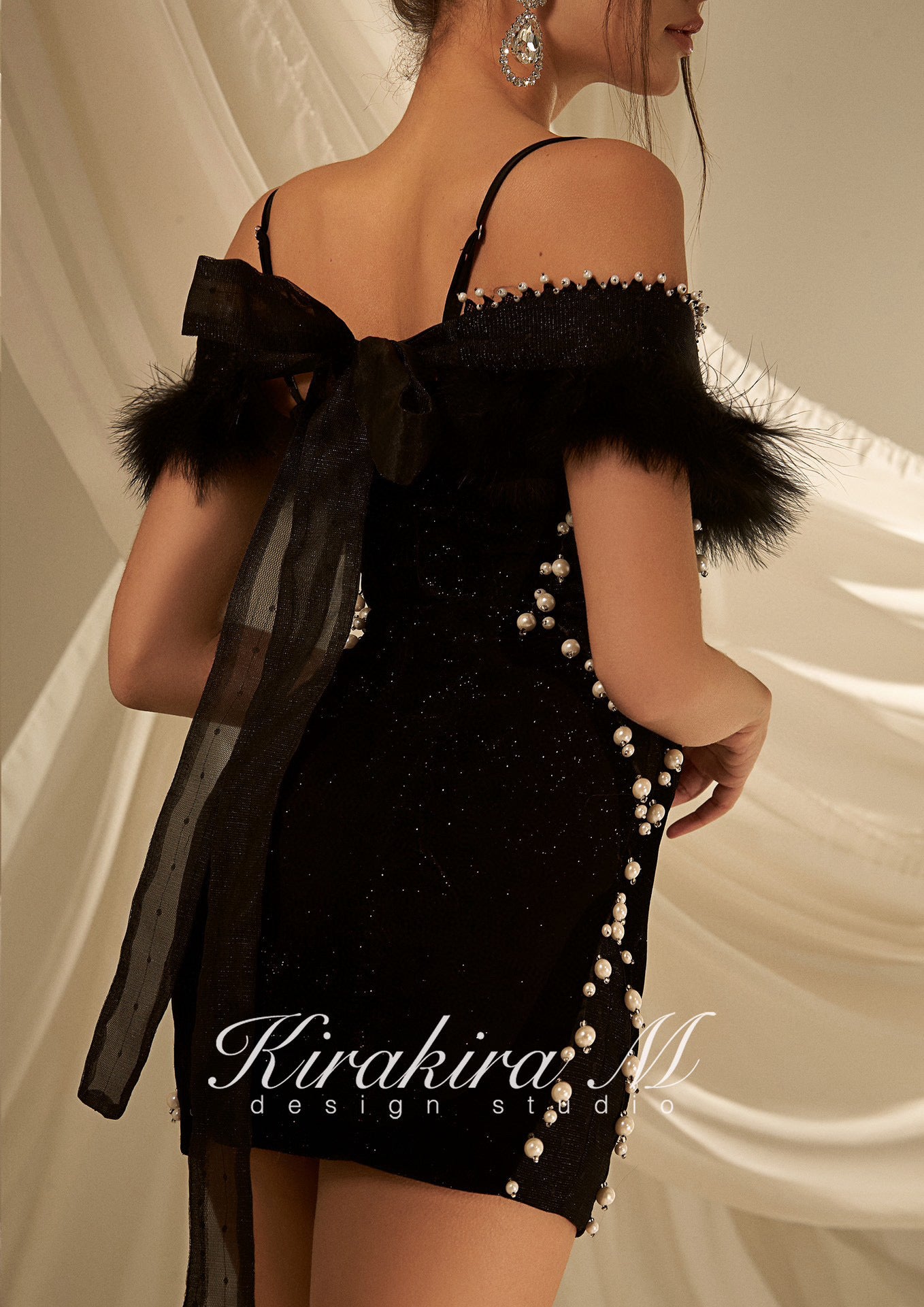 KIRAKIRA M Black velvet off shoulder mini dress with feather deatail