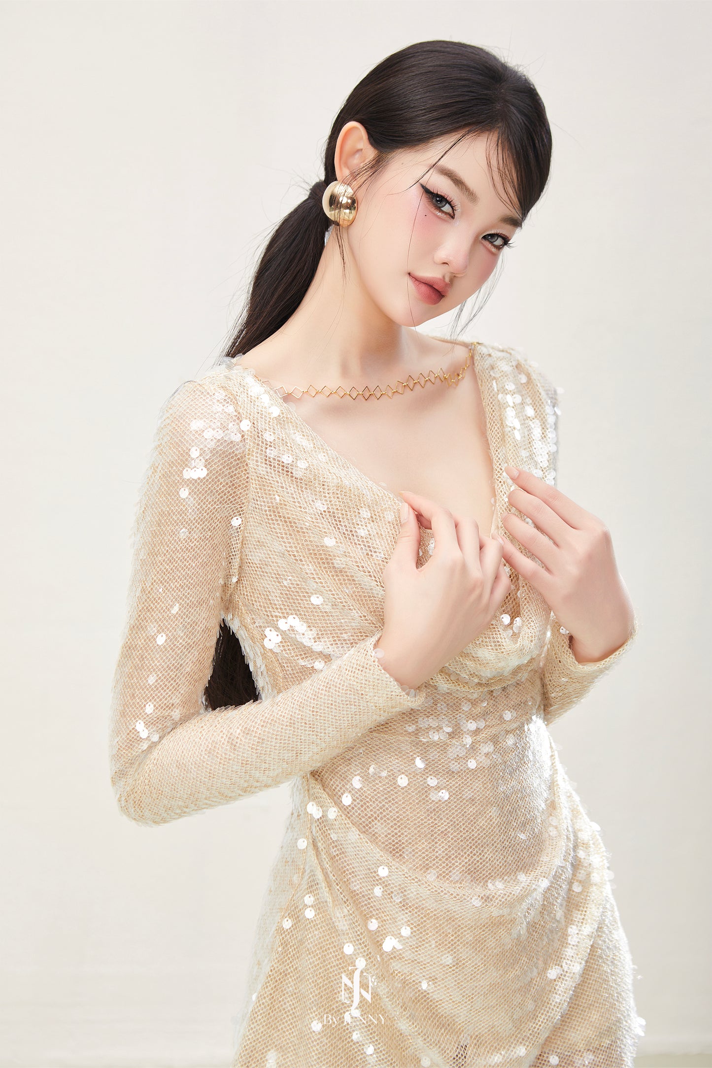 BY JENNY Golden Dalia Mini Dress