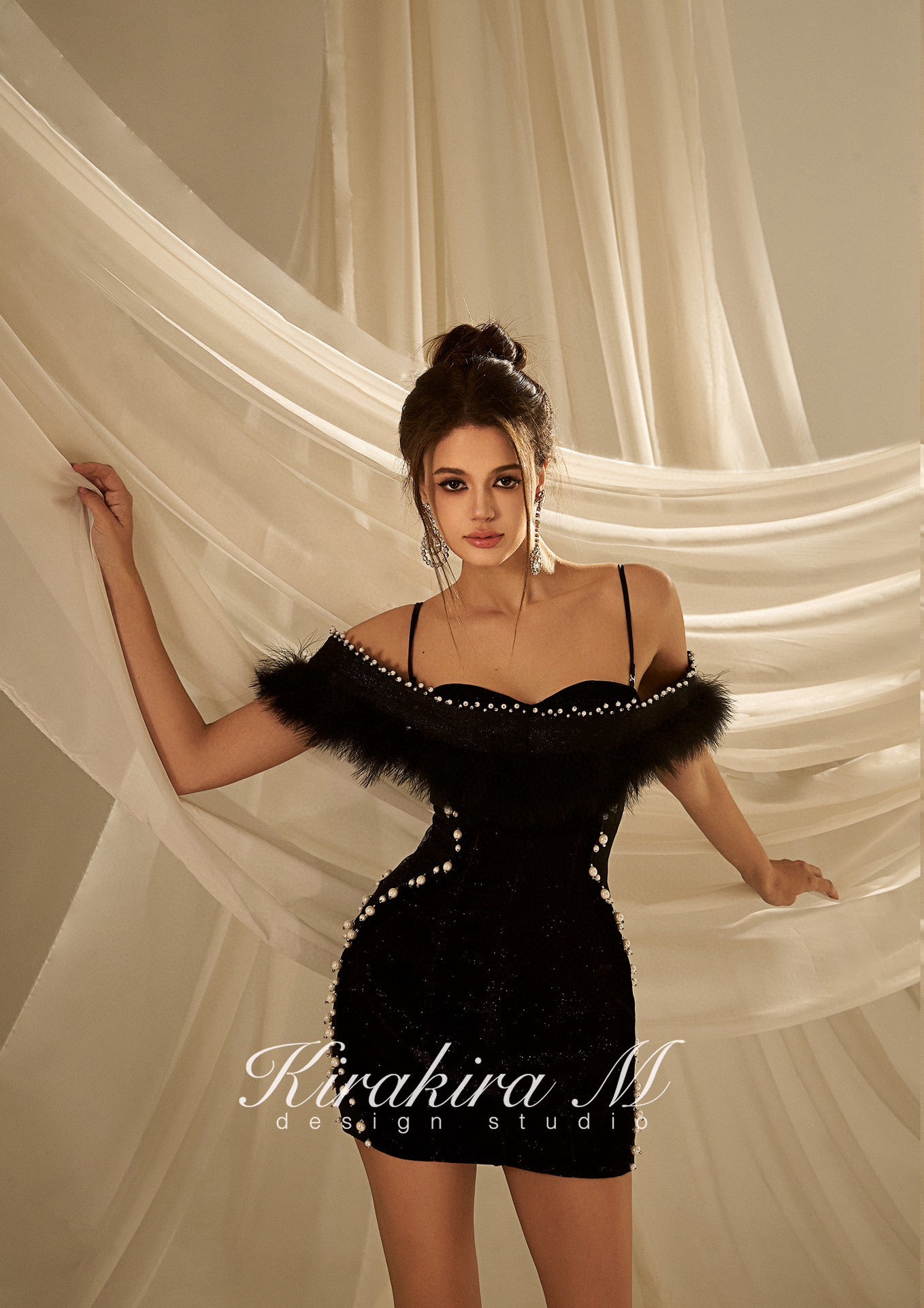 KIRAKIRA M Black velvet off shoulder mini dress with feather deatail