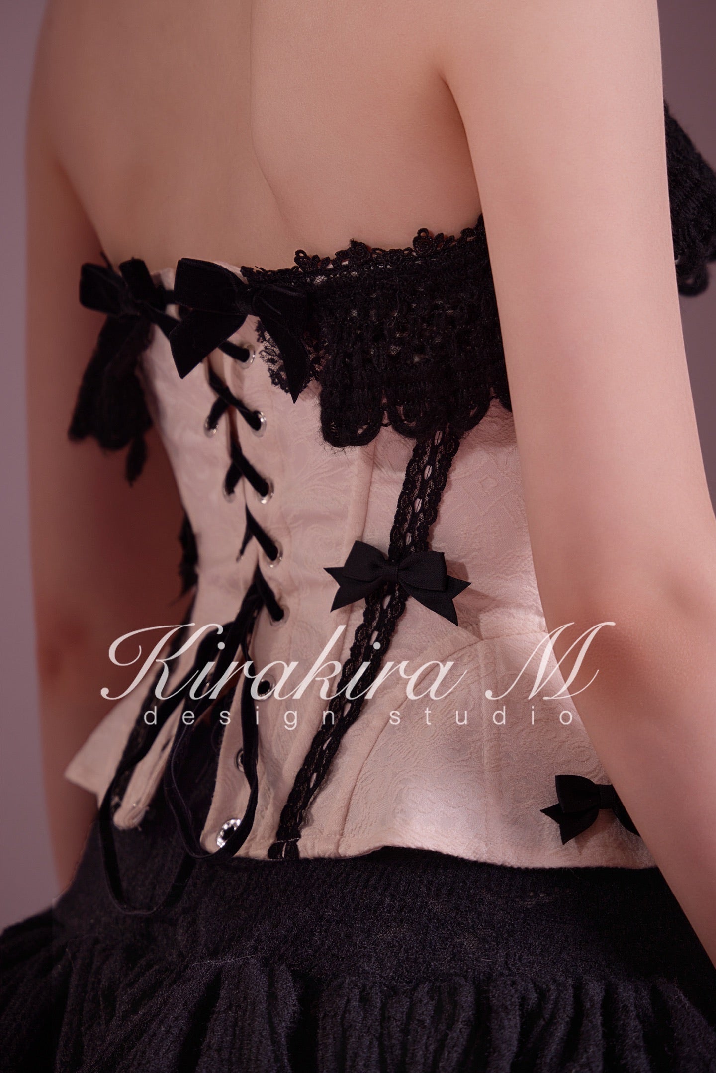 KIRAKIRA M Pink Cinched Waist Drawstring Top & Black Knitted Low-Waisted Bubble Skirt