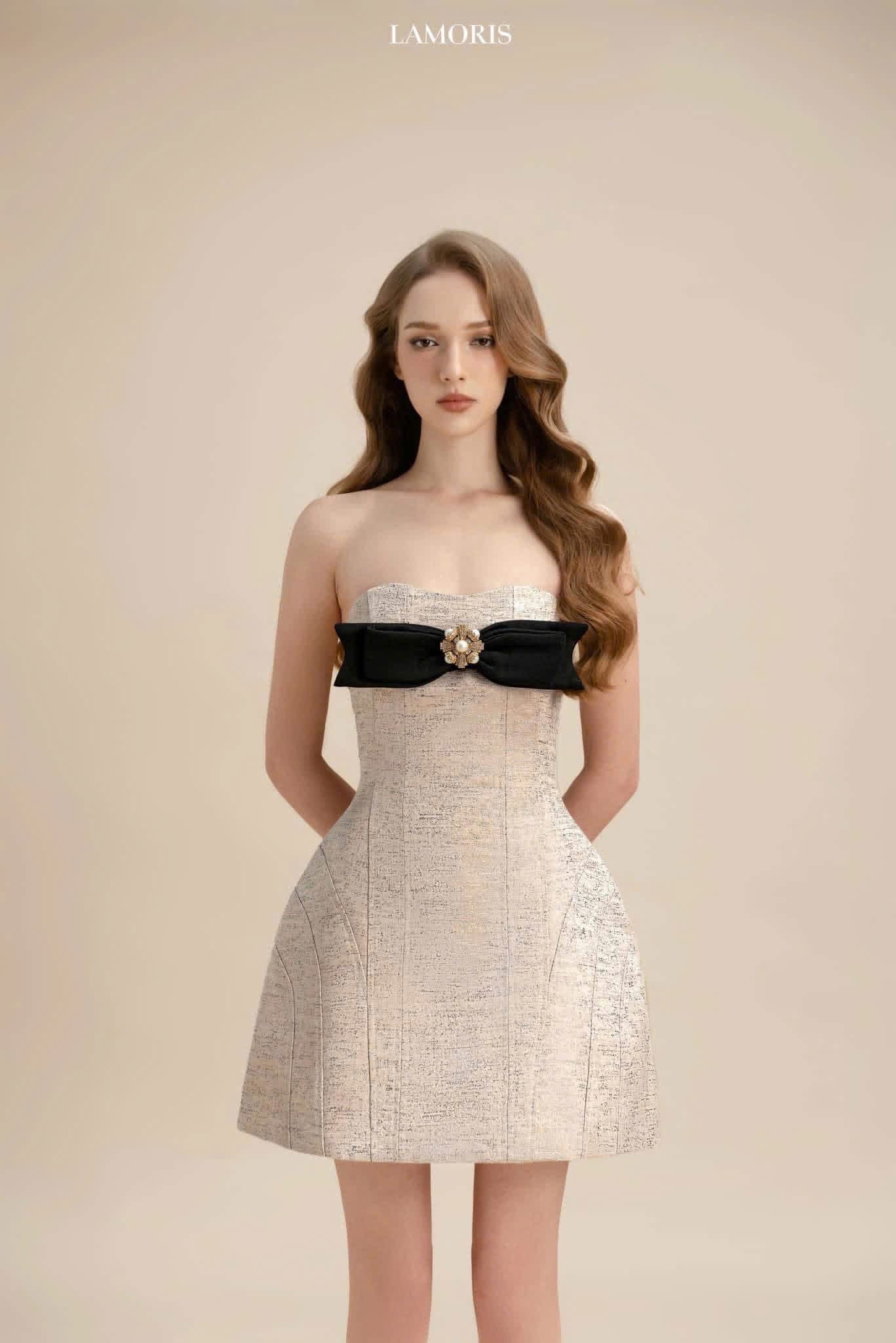 LAMORIS Nude Pieces Black Bow Mini Dress